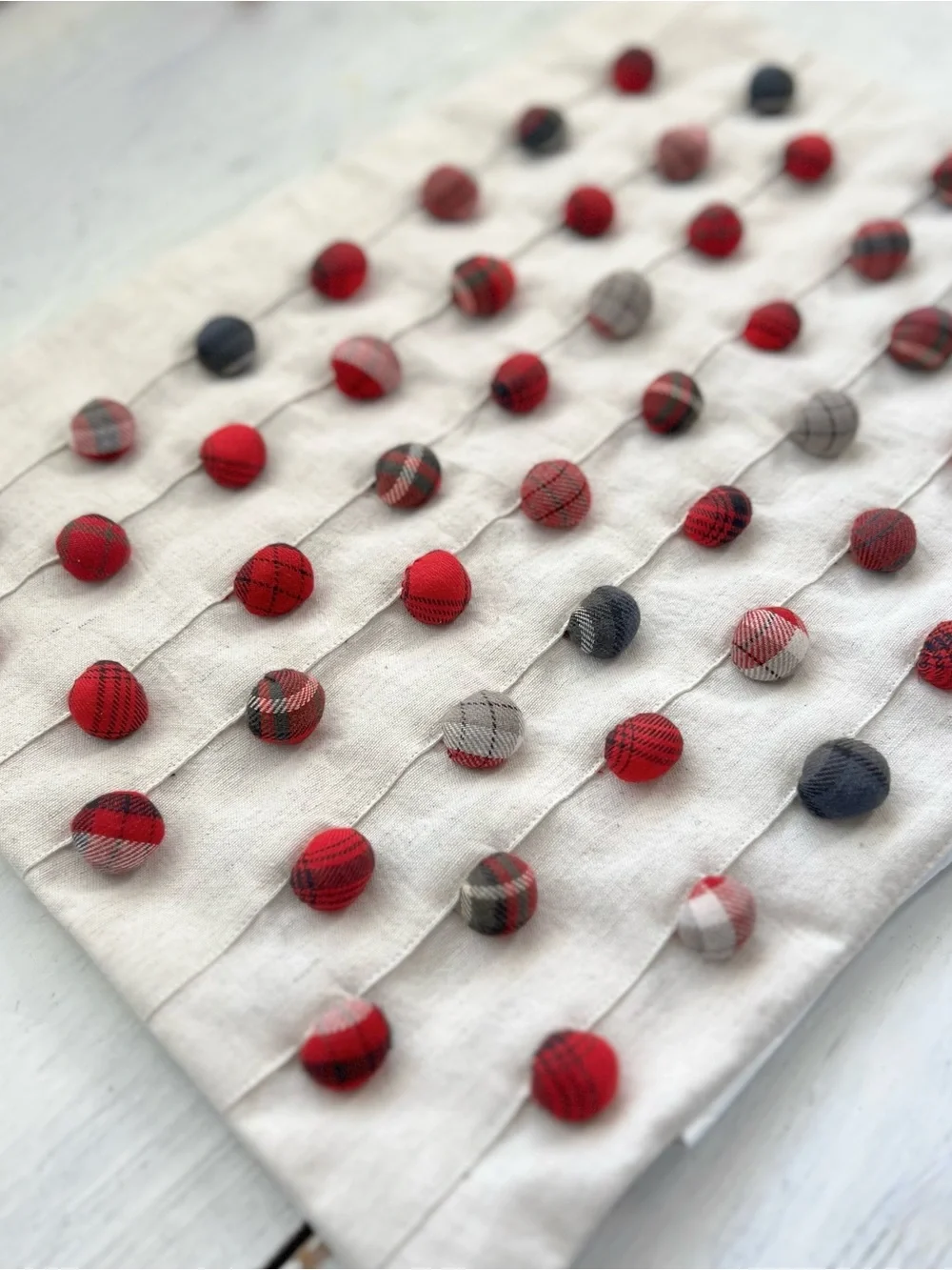 Pottery Barn Cream Pillow with Red and Navy Pom Dots